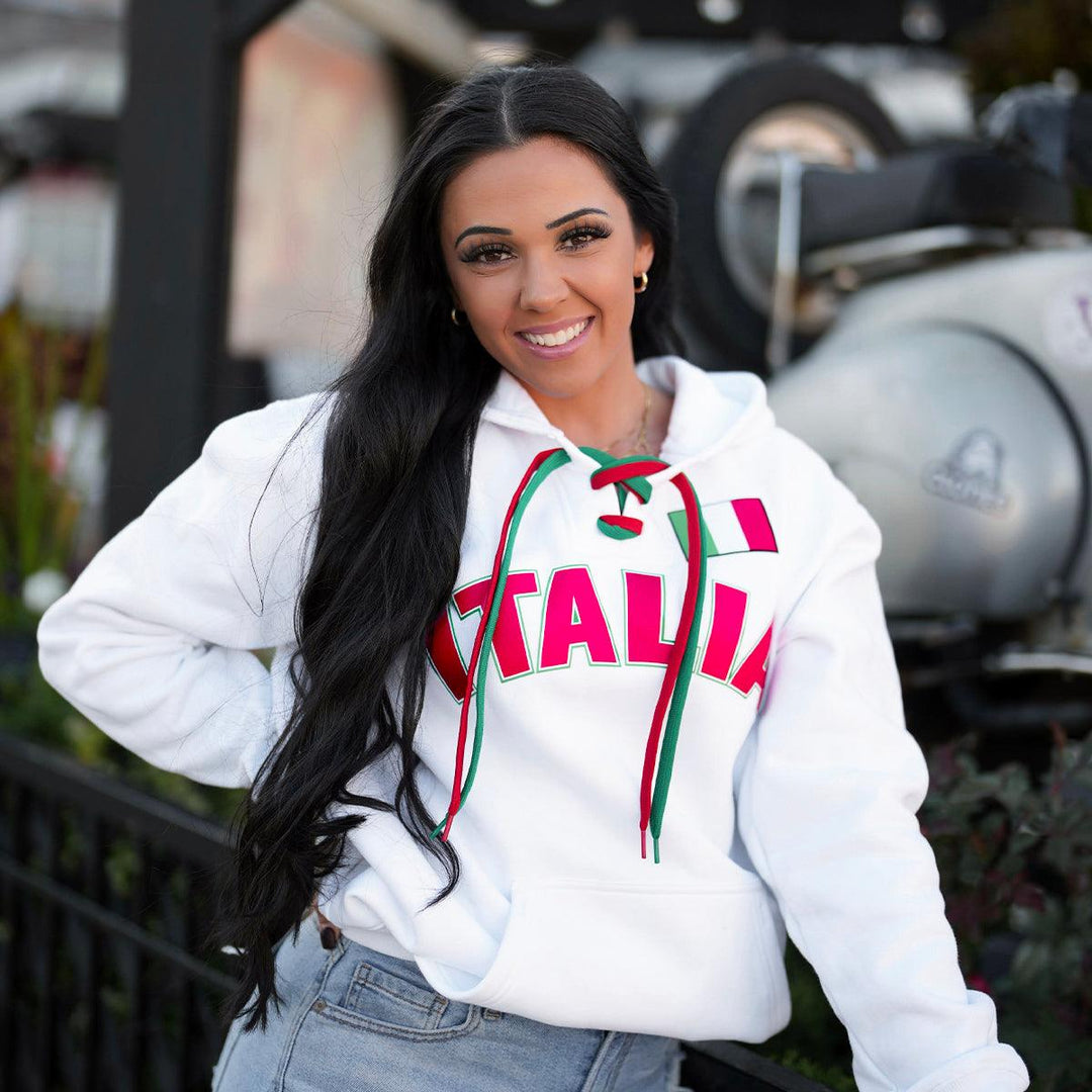 woman wearing white Italia hoodie with pink lettering
